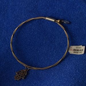 Guitar string bracelet with hamsa pendant charm